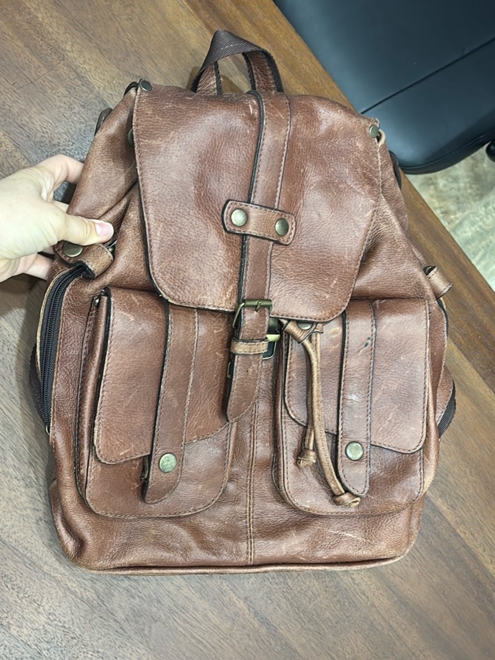 Leather backpack NEVER used but has been sitting in storage